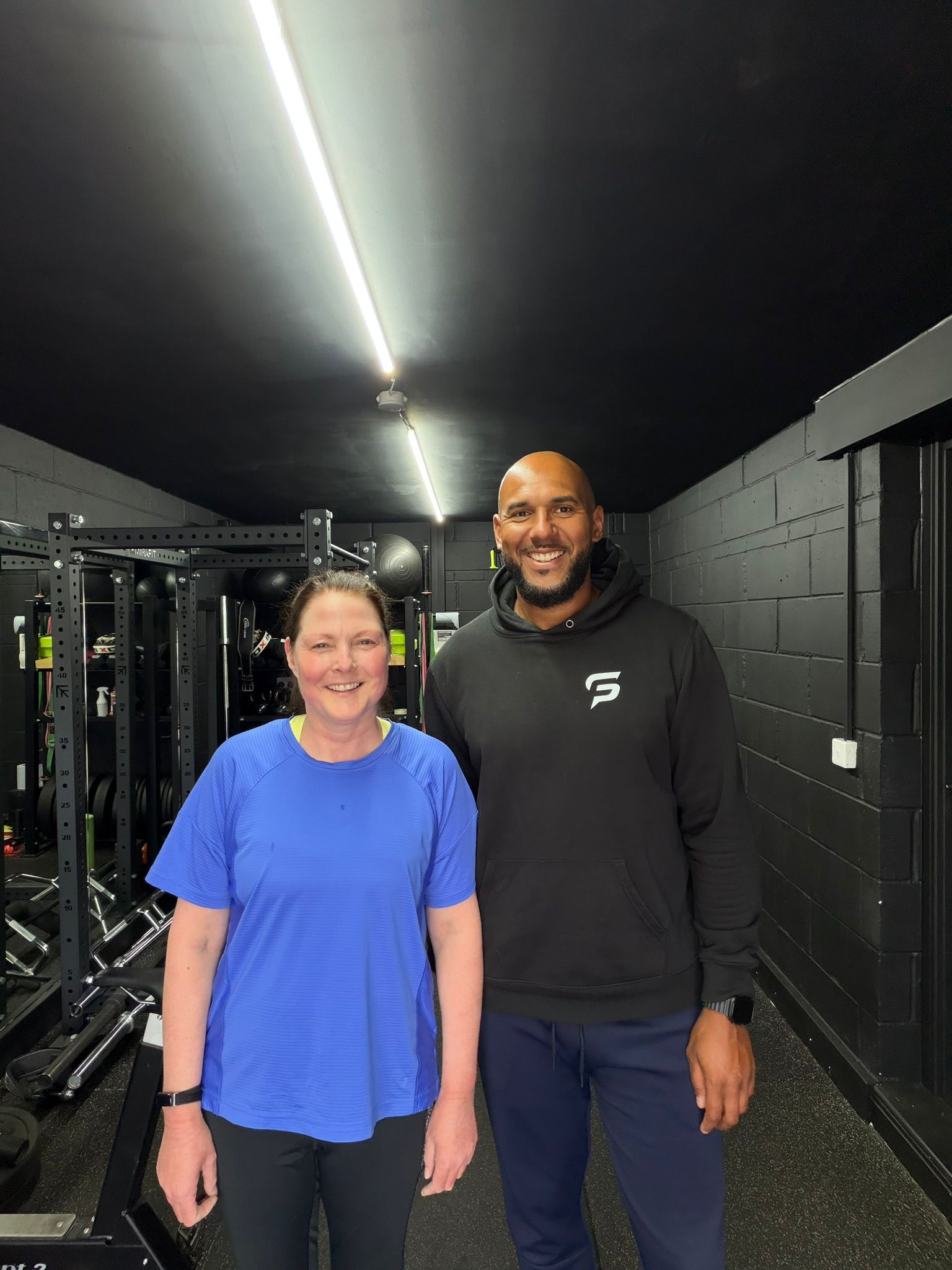 Tim Abeyie with a client at the Speed For Sport gym, Leeds